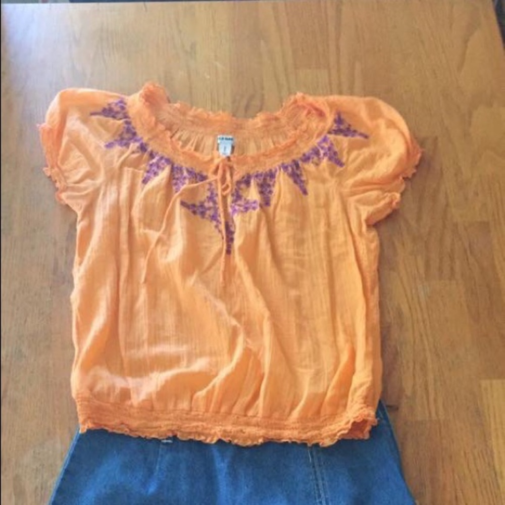 Orange ruffley top